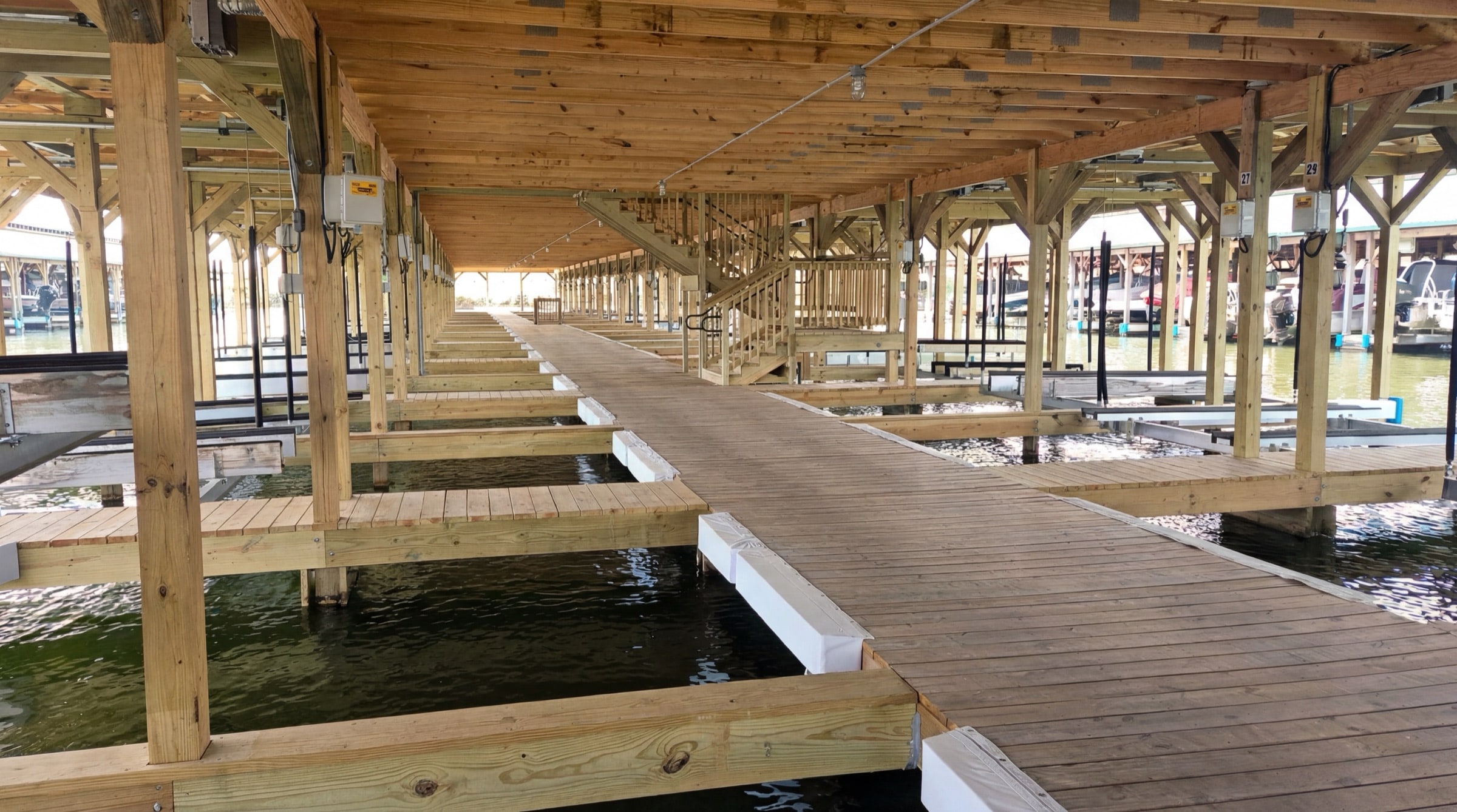 Covered slips with lifts keep the boat ready.